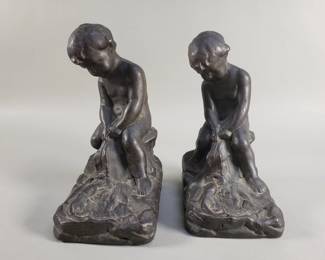 156 Lot 603 Pair of antique patina bronze clad bookends boy fishing