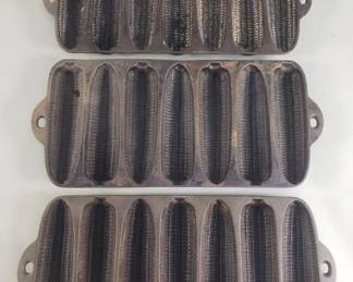 623 Lot 551 3 vintage cast iron bread molds