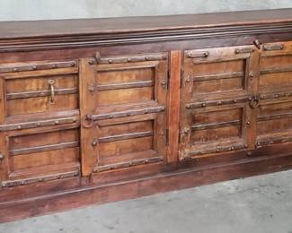 164 Lot 448 Spanish colonial style sideboard with reclaimed architectural doors and decorative iron nails