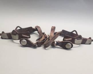 140 Lot 640 Antique steel and leather spurs
