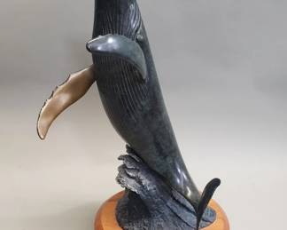 034 Lot 686 Barclay Hill bronze whale sculpture on a wood lazy Susan base