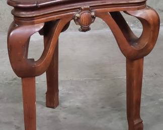 136 Lot 207 Antique mahogany triangular shaped side table
