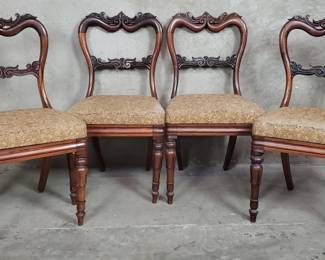 630 Lot 557 4 antique carved teak dining chairs