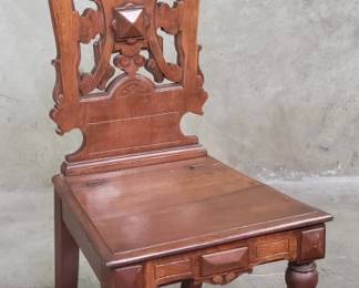 129 Lot 188 Antique hand carved walnut hall chair with storage