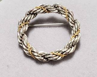 053 Lot 36 Tiffany and Co Sterling silver and 18k gold circular pin brooch