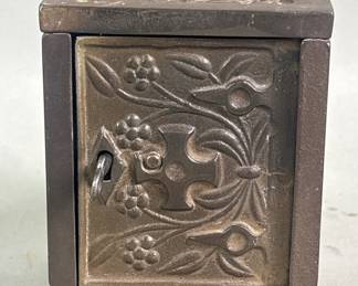 097 Lot 620 Antique J and E Stevens cast iron Still coin bank