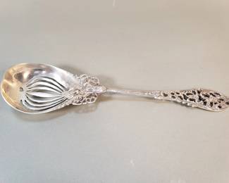 052 Lot 153 Antique sterling silver pierced almond scoop