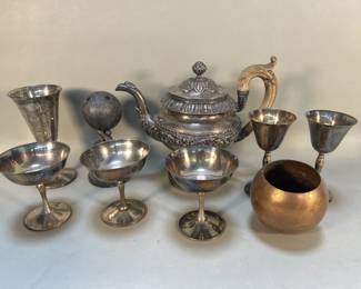 658 Lot 584 Group of silver plate goblets teapot trophy