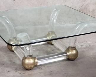 151 Lot 486 Karl Springer style Hollywood Regency acrylic tusk and brass coffee table with glass top