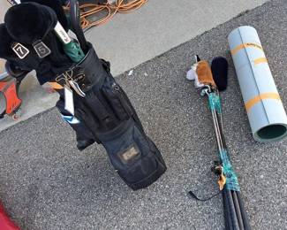 Golf Clubs, Shoes, and Practice Putting Green