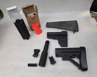 Small Collection of Plastic and Metal Gun Attachments all Made in America
