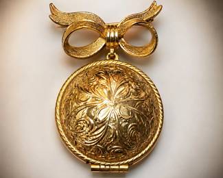 Vintage Gold-Tone Bow Brooch with Ornate Floral Engraved Solid Perfume Compact