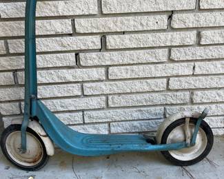 Vintage children’s blue push scooter