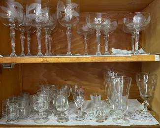 Etched water goblets and champagne glasses