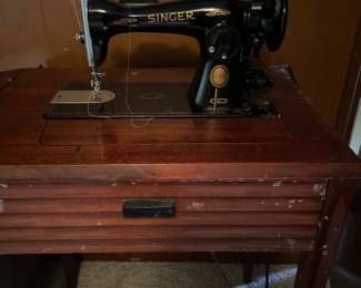 Singer Model#15 electric sewing machine from 1950’s in wooden cabinet
