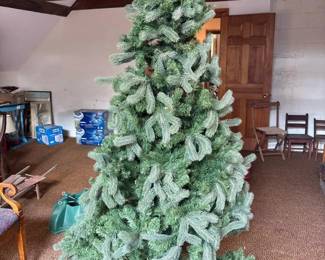 021 twoartificialchristmastreeswithstan