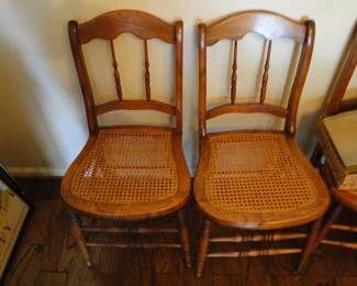 4 of these rush/cane seat chairs