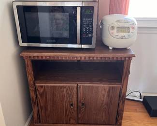 Storage cabinet, microwave, rice cooker