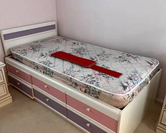 Twin bedframe with storage drawers and swappable colors