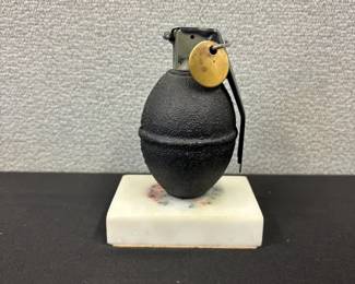 Vintage Inert Hand Grenade on Stone Slab