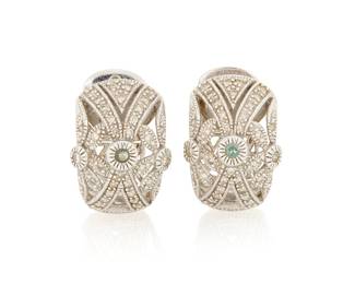 1147 Le Vian: A Pair of 14K White Gold, Diamond and Alexandrite Earrings Of a pair of white gold earrings, each featuring a round alexandrite gemstone weighing approximately 0.04 carat within a pierced oval design accented with round diamonds weighing approximately 0.61 carat, signed Le Vian 2 pieces  Measures: 1 5/8 x 1/2 in. 8.5 grams gross Estimate: $600 - $800