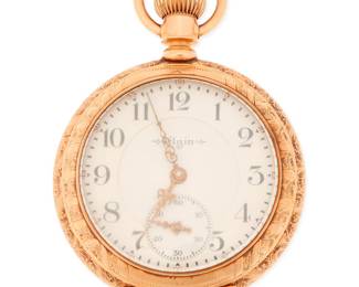 1055 Elgin: A 14K Gold Pocket Watch Dial: white with Arabic numerals Model: railroad Case number: 743023 Signed: dial and movement  Size: 20s 150.0 grams gross Estimate: $1,500 - $2,000