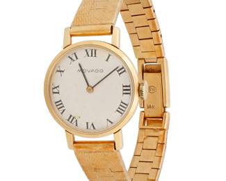1058 Movado: A 14K Gold Watch Dial: 19.00 mm, round with Roman numeral hour markers Case: 22.00 mm Closure: 14k gold link bracelet with notched clasp Signed: dial  Inner circumference: 6 - 6 1/2 in. 29.6 grams gross Estimate: $1,200 - $1,800