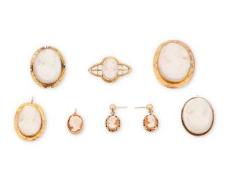 1016 Group of Gold and Cameo Jewelry Including three brooches, three pendant/brooches, one pendant and one pair of earrings, set with shell and carved coral cameos 8 pieces  Measures: 3/4 x 1/2 - 1 5/8 x 1 1/4 in., Earrings: 1 x 1/2 in. 44.6 grams gross Estimate: $500 - $700