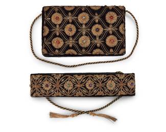 1238 A Set of Vintage Embroidered Velvet Evening Accessories Comprising a black velvet Byzantine-style evening bag and matching tie belt, each with elaborate metal thread bullion embroidery with floral and medallion motifs featuring set hardstone beads including amethyst and moonstone, and with back and gold cording straps and tasseled ties, likely French 2 pieces  Bag: 5 x 8 x 1 in., strap drop: 21 in.; Belt: 27 3/4 x 2 1/8 in., including ties: 64 in. Estimate: $100 - $150