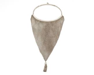 1239 A Vintage Continental Silver Mesh Purse Early/mid-20th century The long purse designed with an oval frame handle suspending a triangular mesh bag finished with a tassel to the point Stamped to frame interior: Coda / 800  15 1/2 x 6 1/2 in. (with tassel) 245.8 grams gross Estimate: $200 - $300