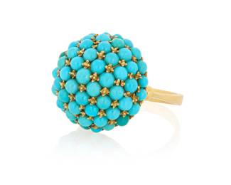 1131 An 18K Gold and Turquoise Ring Of a domed design set with round turquoise cabochons, with partial maker's mark  Size: 8 10.5 grams gross Estimate: $1,000 - $2,000