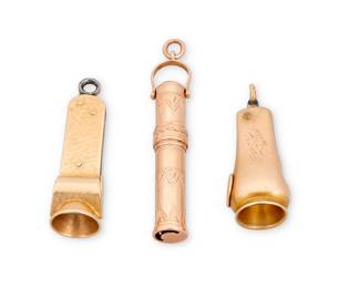 1103 A Group of 14K Gold and Metal Accessories Including two cigar cutters and one detractable pen 3 pieces  Measures: 1 5/8 in., 1 7/8 in. and 2 1/4 in. 23.1 grams gross Estimate: $800 - $1,200