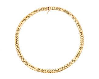 1004 A 14K Gold Chain Featuring a curb link design  Length: 16 1/2 in. 21.5 grams gross Estimate: $1,500 - $2,000