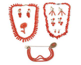 1120 A Group of Coral jewelry Including two necklaces, one bracelet, one brooch and four pairs of earrings featuring various coral beads and carved coral elements 12 pieces  Necklaces: 17 in., Bracelet: 7 1/2 in., Earrings: 1/2 - 1 1/2 in., Brooch: 2 x 1 1/4 in. 114.9 grams gross Estimate: $400 - $600