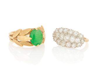 1109 A Group of Two 14K Gold Rings Including a foliate design centering an oval jade cabochon, together with a ring featuring three diamond set rows 2 pieces  Sizes: 3 and 5 8.4 grams gross Estimate: $600 - $800