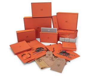 1264 Hermès: A Group of Luxury Packaging & Ancillary Items Circa 1980s and later A large group of various Hermès branded presentation boxes for handbags, scarves, jewelry, watches, and small leather goods, as well as retail bags in various shapes, styles, and sizes, various dust bags, and branded Hermès brown ribbons, some marked for different years, approximately 50 boxes, 23 retail bags, 20 dust bags, and multiple lengths of ribbon  Largest box: 15 x 18 x 3 1/2 in. Estimate: $200 - $300
