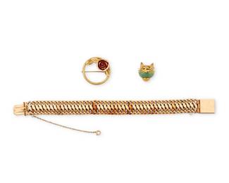 1104 A Group of Gold Jewelry Including a 14k gold link bracelet, a 14k bi-color gold wreath brooch and an 18k gold and nephrite jade cat pin 3 pieces  Bracelet: 7 1/2 in., Brooch: 1 1/4 in., Pin: 3/4 x 1/2 in. 31.3 grams gross Estimate: $1,500 - $2,000