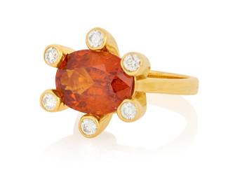 1173 An 18K Gold, Hessonite Garnet and Diamond Ring Centering an oval hessonite garnet measuring approximately 13.79 x 10.31 x 6.90 mm, accented by six round diamonds  Size: 7 1/2 14.3 grams gross Estimate: $2,500 - $3,500