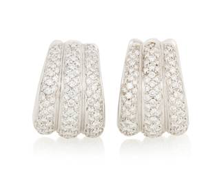 1065 A Pair of 18K White Gold and Diamond Earrings Featuring a three-band design set with round diamonds weighing approximately 2.25 carats total 2 pieces  Measures: 1 /2 x 7/8 in. 20.8 grams gross Estimate: $1,500 - $2,000