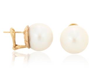 1037 A Pair of Gold and South Sea Cultured Pearl Earrings Featuring two South Sea cultured pearls measuring approximately 15.50 and 15.60 mm 2 pieces  Measures: 1/2 in. 15.0 grams gross Estimate: $700 - $900