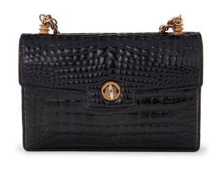 1223 Gucci: A Vintage Chain Strap Shiny Alligator Flap Bag Circa 1960s, Italy A small front flap bag in black alligator with gold-tone hardware, turn-key flap closure, short chain handle, and pocket under the flap, the interior in smooth black leather with multiple pockets, one with zip closure, and one with a mirror Stamped to interior flap: Gucci / Made in Italy / 15  5 x 7 1/2 x 1 1/2 in., drop: 5 1/2 in. Estimate: $300 - $500
