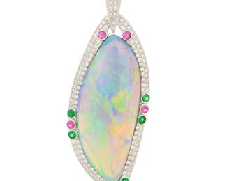 1071 An 18K White Gold and Opal Pendant Centering an organic opal cabochon, set in a white gold frame featuring round diamonds, rubies and tsavorite garnets  Measures: 2 x 3/4 in. 8.0 grams gross Estimate: $2,500 - $3,500