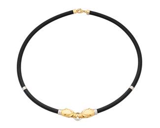 1116 An 18K Gold and Rubber Collar Of a panther-motif collar necklace, designed as a stylized panther with sculpted detailing, terminating in a rigid collar, signed RCT Turkey  Measures: 18 in. 22.6 grams gross Estimate: $1,000 - $2,000