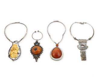 1205 A Group of Stone and Silver Jewelry Comprising a sterling silver collar necklace suspending a chunky carved greenstone pendant (16 x 5 1/2 in.), two sterling silver chokers, one with a large carved butterscotch amber rose motif (15 1/4 x 5 in.), and one suspending a central set amber teardrop cabochon (16 1/4 x 4 1/4 in.), as well as a small mixed-metal belt clasp or ornament with a round set amber-colored resin cabochon (8 x 3 x 1 1/2 in.), 4 pieces  543.9 grams gross Estimate: $200 - $400
