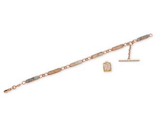 1094 A Group of Gold and Gold in Quartz Jewelry Including a 10k rose gold and gold-in-quartz watch chain together with a 21k gold and gold in quartz pendant 2 pieces  Chain: 12 in., Pendant: 1 x 5/8 in. 31.5 grams Estimate: $800 - $1,200
