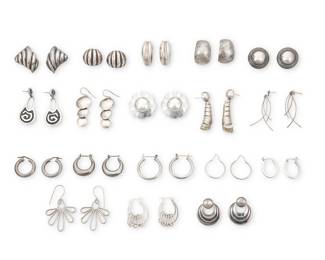 1199 A Large Group of Silver & Mixed Metal Earrings Comprising eighteen pairs in various styles including hoops, dangles, wire dangles, hammered silver, concha-style plaques, silver overlay, and modernist-style shapes, three with clips Variously marked for maker: ND / JA / DDD / ND / AB / Bayanihan Ltd.; thirteen marked for sterling; five marked for Mexico; five unmarked 36 pieces  2 in. to 1 in. 156.3 grams gross Estimate: $200 - $400
