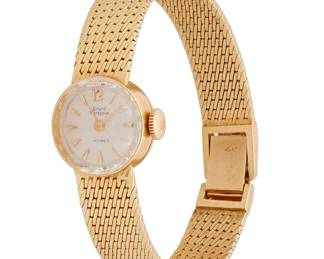 1059 Girard Perregaux: A 14K Gold Watch Dial: 12.00 mm, round with baton hour markers Case: 15.00 mm Closure: 14k gold link bracelet with notched clasp Signed: dial, monogram on case back E.C.H  Inner circumference: 5 3/4 - 6 in. 21.9 grams gross Estimate: $700 - $900