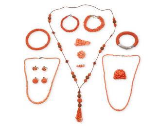 1118 A Group of Coral Jewelry Including three necklaces, four bracelets, four brooches and two pairs of earrings, featuring various coral beads and carved coral elements 15 pieces  Necklaces: 17 - 34 in., Bracelets: 6 1/4 - 8 1/4 in., Earrings: 1/2 and 3/4 in., Brooches: 1 - 2 1/4 in. 164.9 grams gross Estimate: $500 - $700