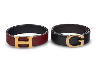 1235 Hermès & Gucci: Two Designer Leather Belts Late 20th century  An Hermès dark red 38 mm "H" belt buckle & belt, circa 1996 With a gold-toned removable "H" buckle on a textured red leather belt, with black leather lining Belt marked: Hermès / Paris / Made in France; Z [circle] / 0T [3 or 8]; buckle: Hermès / [hallmark] Size 85; buckle: 38 x 62 mm / 1 1/2 in. x 2 3/8 in.; belt: 995 x 32 mm / 39 1/8 in. x 1 1/4 in.  A Gucci black leather belt with gold-toned "G" buckle With a gold-toned "G" buckle and textured black leather belt, with black leather lining Belt marked: Gucci / Made in Italy / 80.32.036 / 1406.0956; buckle: Gucci Size 80/32; buckle: 45 x 60 mm / 1 3/4 in x 2 3/8 in.; belt: 1032 x 35 mm / 40 5/8 in. x 1 3/8 in.  2 pieces Estimate: $300 - $500