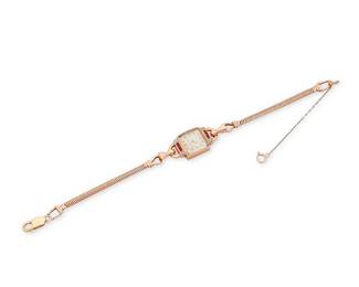 1056 Longines: A 14K Rose, Ruby and Diamond Gold Watch Dial: 12.90 mm, square with Arabic hour markers Case: 14.50 mm Closure: rose gold link bracelet with added 14k yellow gold lobster clasp Signed: dial  Inner circumference: 8 in. 18.2 grams gross Estimate: $600 - $800